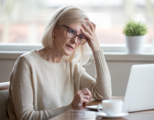 woman with cognitive decline looking at computer